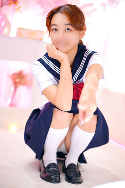 �߂���